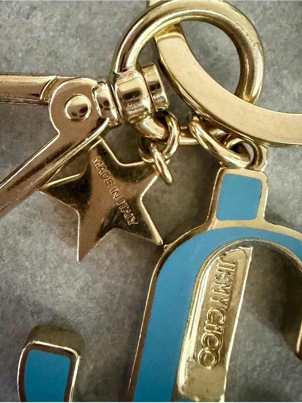 Jimmy Choo Enamel JC Star Logo Bag Charm Keychain in Gold-Tone and Light Blue